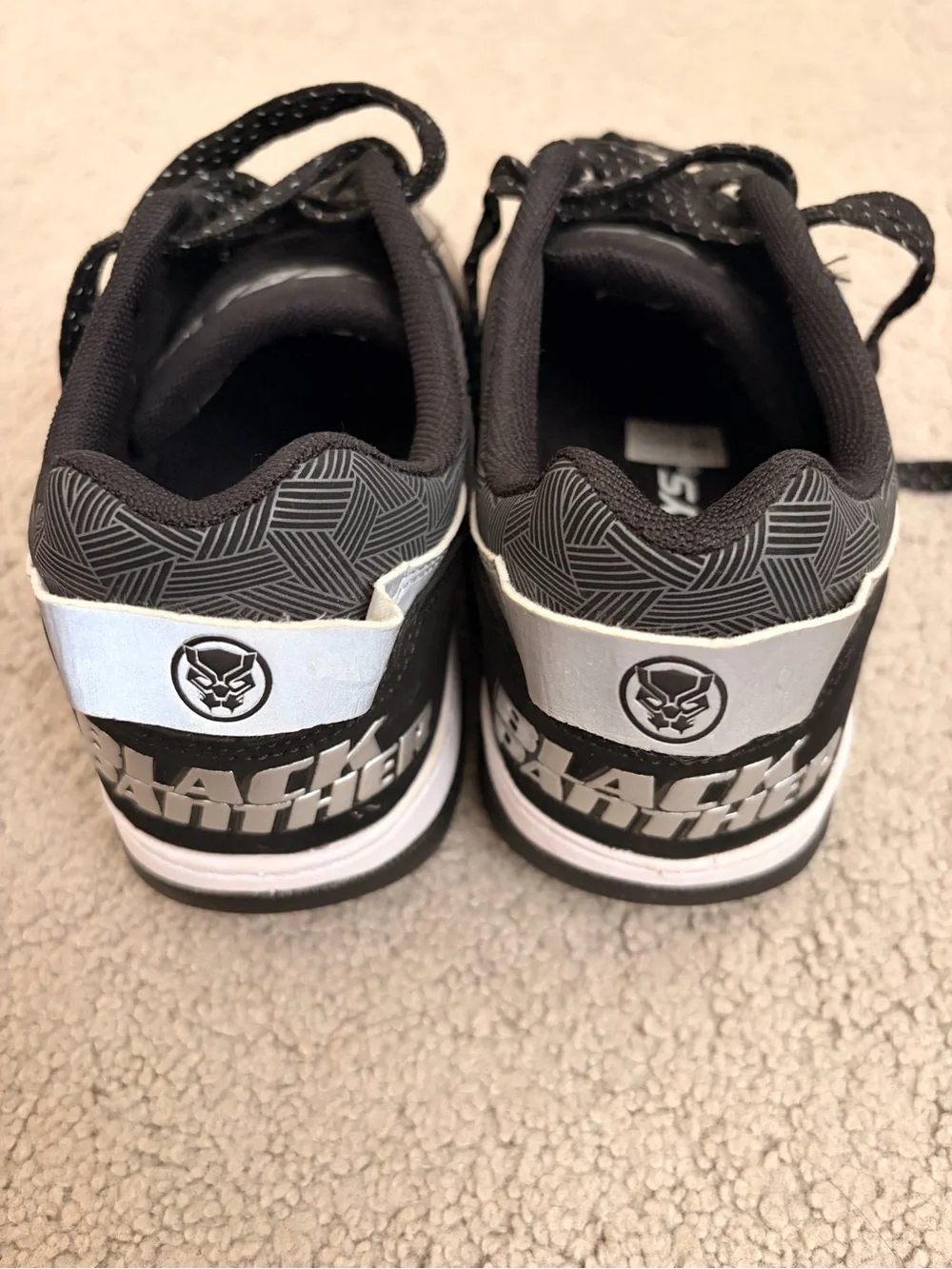 Heelys Black and White Kids' Sneakers with Subtle Blue Accent